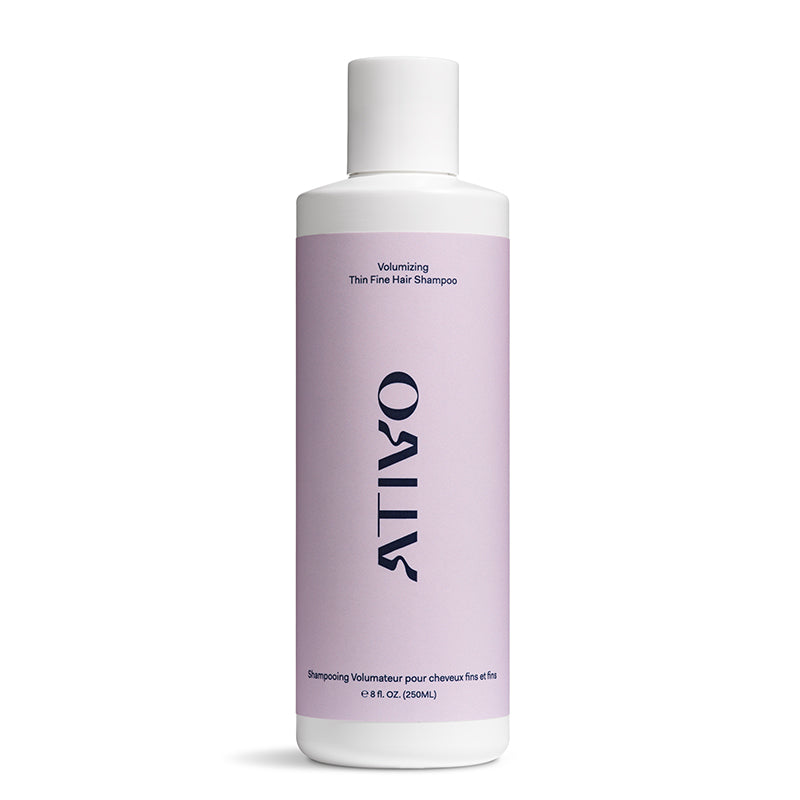 Volumizing Thin & fine hair shampoo on a white back ground